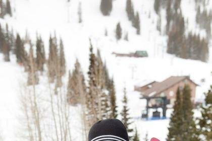 A snowboarder takes a break at a ski resort in Utah. Photo: iStock