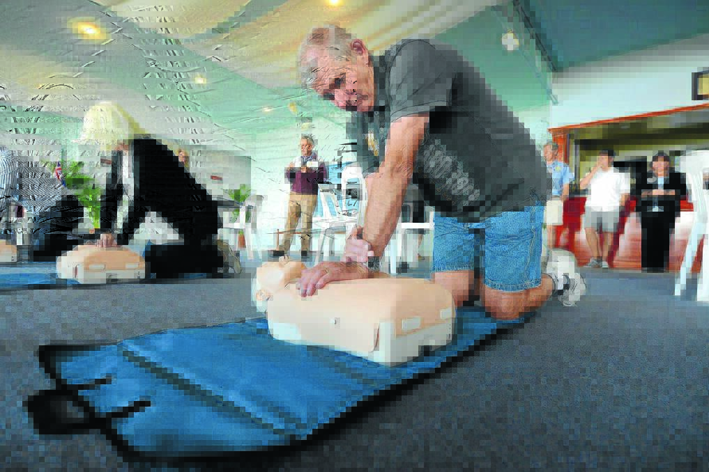 A life saving skill: Rodney Yarnold learning CPR at one of two Rotary Club sessions.