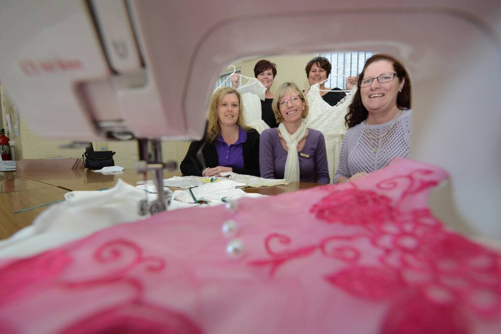 Locals supporting locals in their time of grief and need: Rhonda Barker, Melinda Mills, Tess Chown, Kellie Brett and Kym Cross are the team behind Angel Gowns Mid North Coast. An open day, dress collection and volunteer meet and greet day is being held at Club Taree this Sunday.