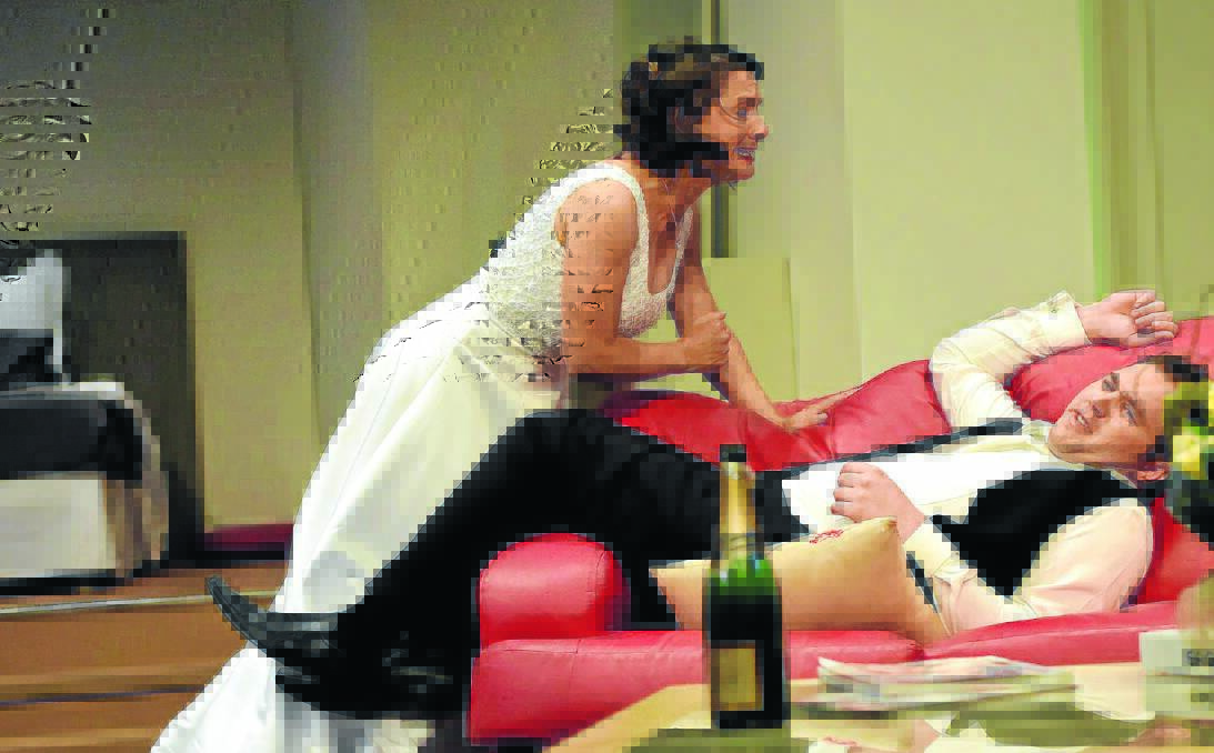 Bride to be Meg Bacon (Alycia Ferguson) and groom James Davis (Corey Smith) in a scene from Secret Bridesmaids' Business