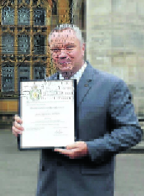 Taliban firefight: Joel with his commendation for bravery at Government House.