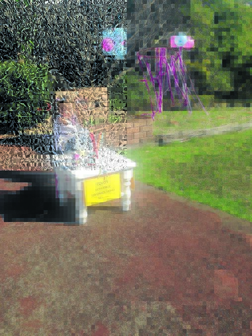 Donations big and small: Coco Lipscombe raised $13 selling lemonade at during Old Bars Garage Sales R?Us day recently.