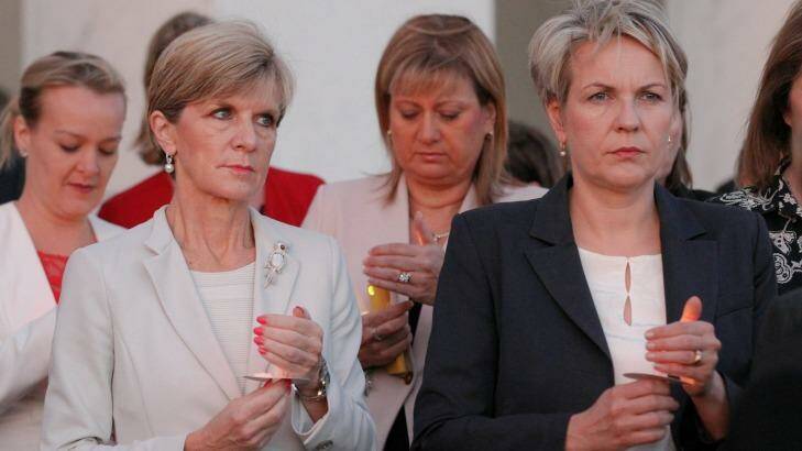 Foreign Affairs Minister Julie Bishop and Deputy Opposition Leader Tanya Plibersek during a candlelight vigil for Andrew Chan and Myuran Sukumaran in February.  Photo: Alex Ellinghausen