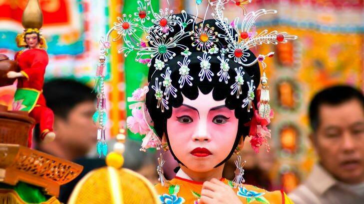 Child actors on a traditional parade on Chinese New Year in Guangzhou, China.
