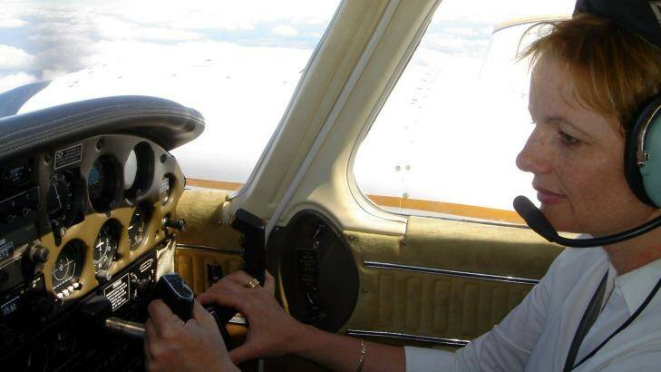 Ms Ley at the controls of her light plane. Photo: Supplied