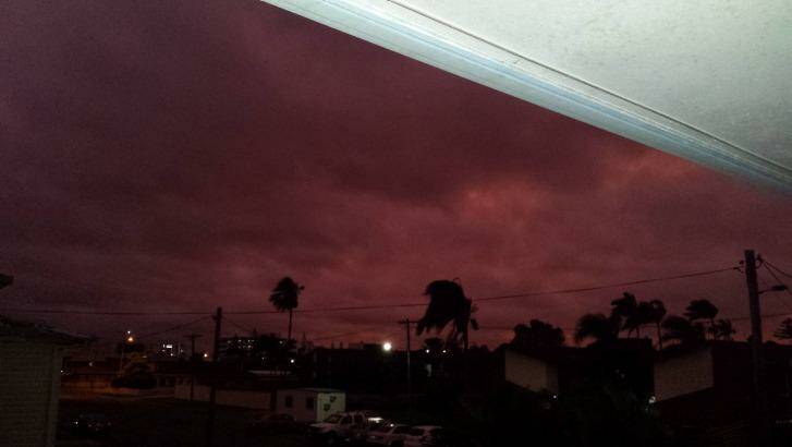 The sky turned red in Mackay as Tropical Cyclone Marcia approached on Thursday night. Photo: Casi Baker