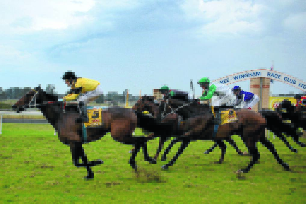 Thomas Huet wins the Stacks The Law Firm Taree Gold Cup on Ghost Protocol last year.