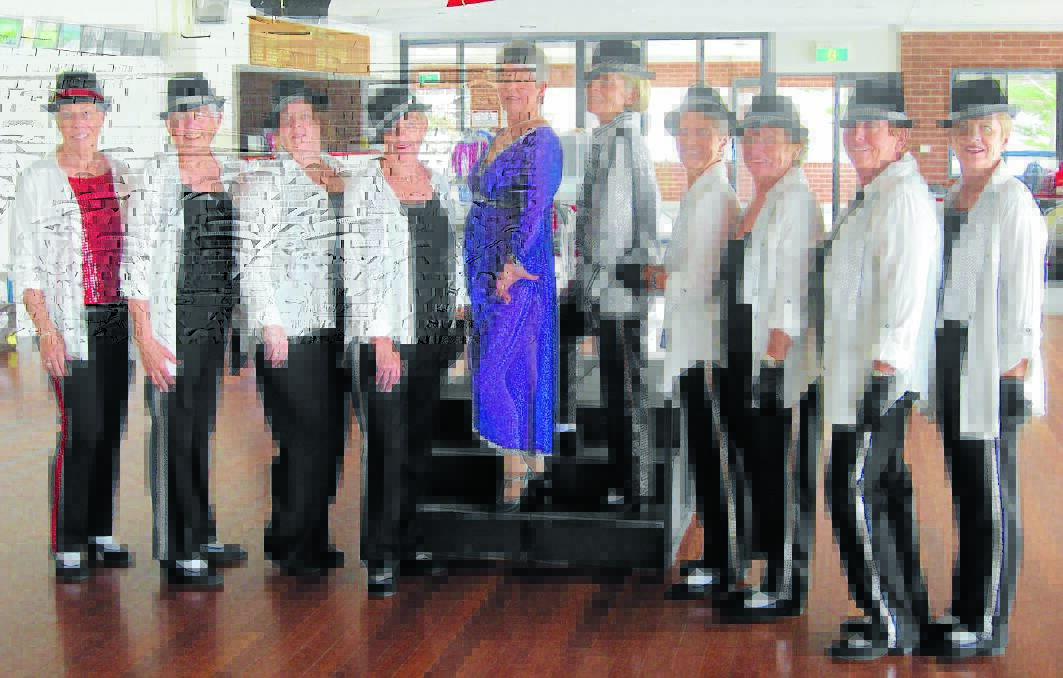 Dancers from the Annie Rose Dancing Academy rehearse a Michael Jackson number for their charity concert at the Tuncurry Beach Bowling Club.