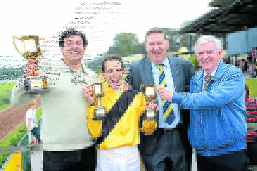 Trainer Shannon Perry, jockey Thomas Huett, Taree Wingham Race Club president Greg Coleman and Tim Stack from Stacks the Law Firm Taree at the trophy presentation for the 2015 Taree Gold Cup.