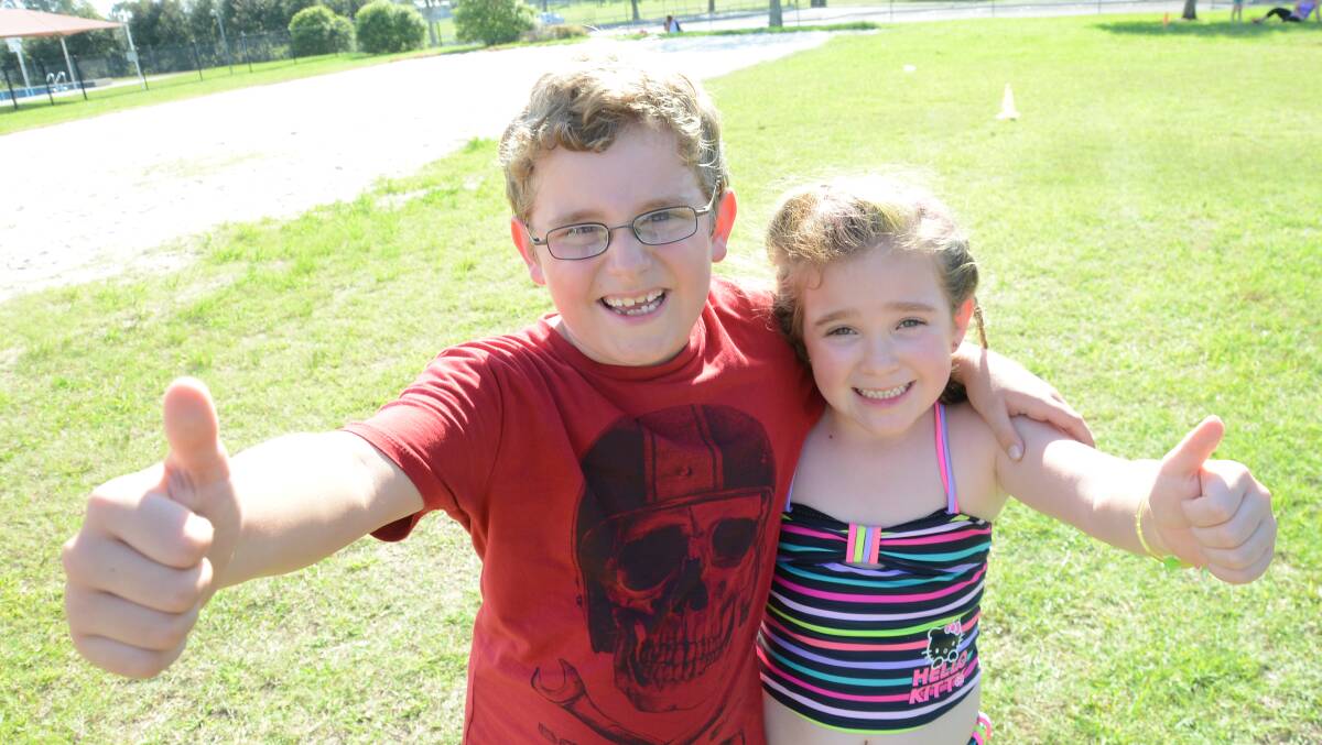 A Thumbs Up! to the YMCA Kids Fun Day event from Bailey and Amara Hilton from Wingham.