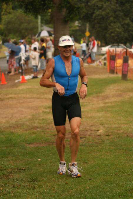 Richard Sewell wins the Taree Triathlon in 2007. He'll race in the local triathlon - held now at Crowdy Head, for the first time on Sunday since then.