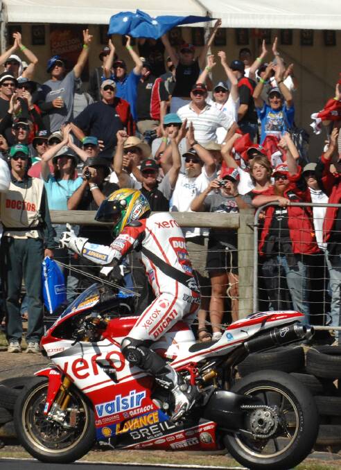 Troy Bayliss celebrates his win in the World Superbike round at Phillip Island in 2008. He'll continue his Superbike comeback this month in Thailand.
