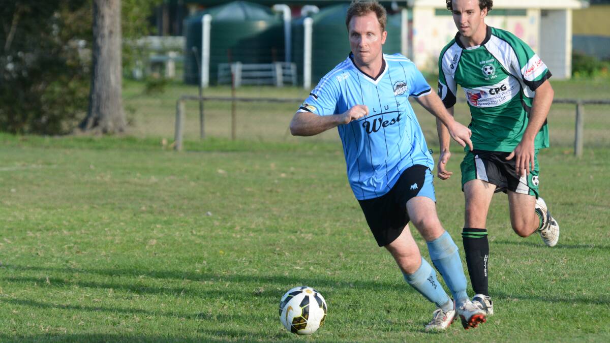 Taree's Justin Atkins goes on the attack in the clash against Port United last week. The Wildcats meet premiers Wallis Lake at Forster on Saturday.