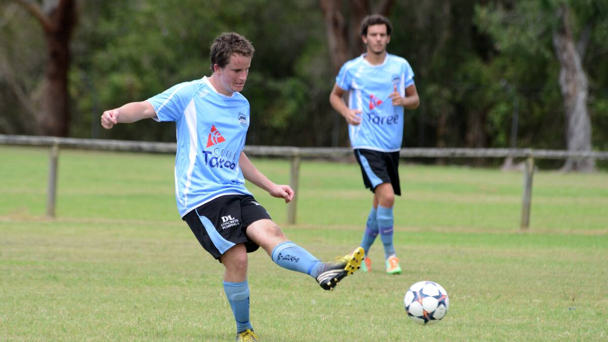 Tom Griffin goes on the attack for Taree in the FFA Cup clash against Tuncurry-Forster at Omaru Park.