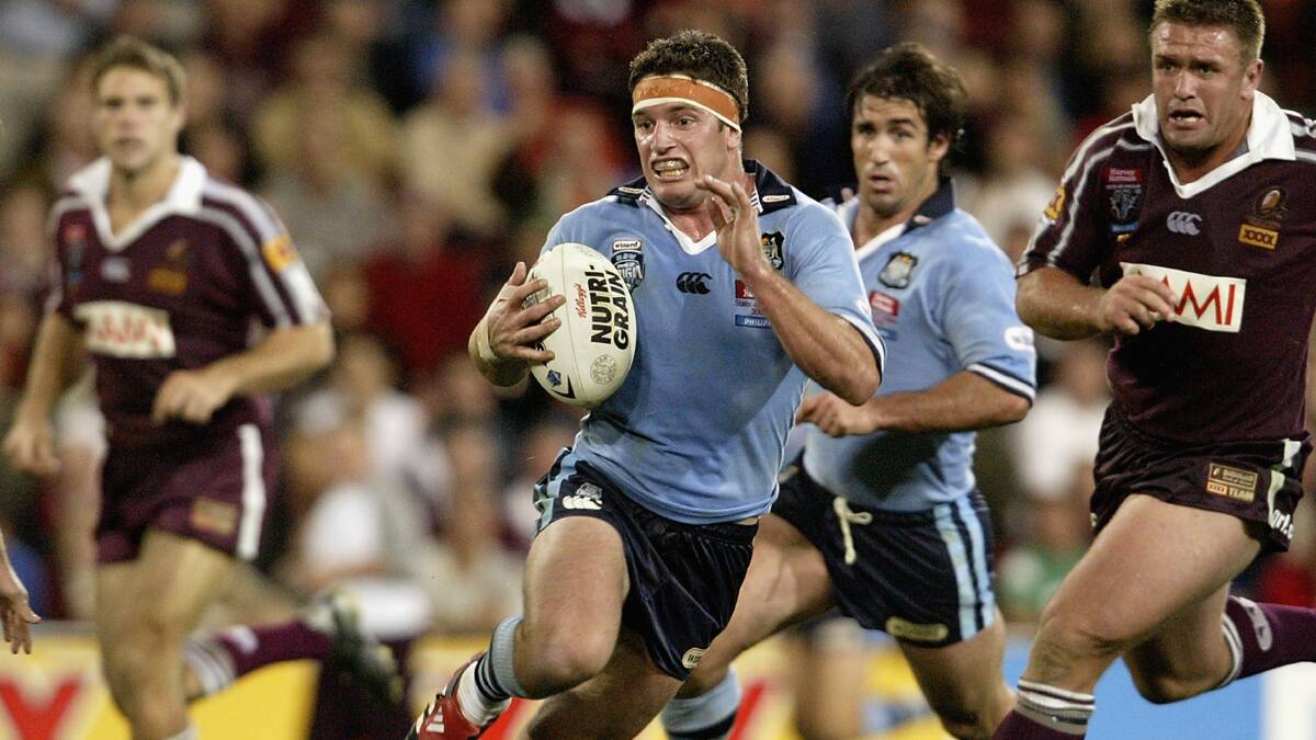 Danny Buderus makes a break for NSW in a State of Origin clash in 2005. A field will be named in his honour at Taree Recreation Centre on Saturday January 24.