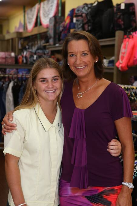 Chelsea Green with Layne Beachley during the former world champion's visit to Taree earlier this year.