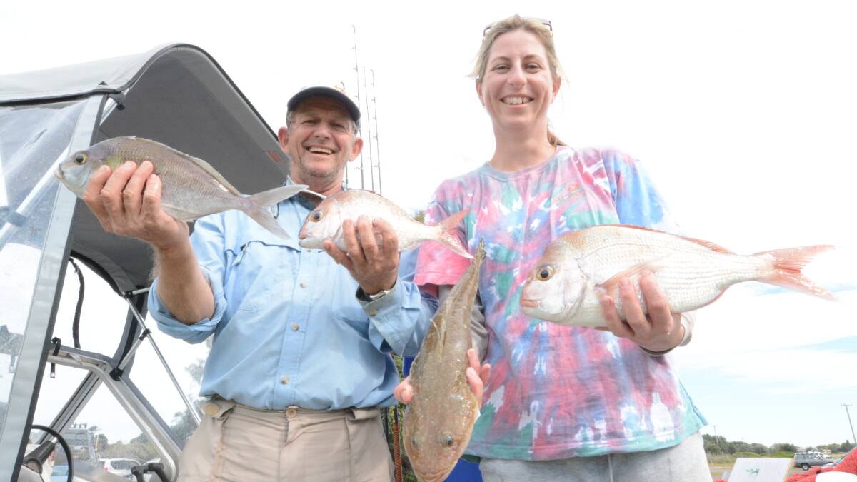 Port Macquarie anglers Les Proctor and Renee Ferguson with some of their catch from the two day championships. Renee won the women's championship.