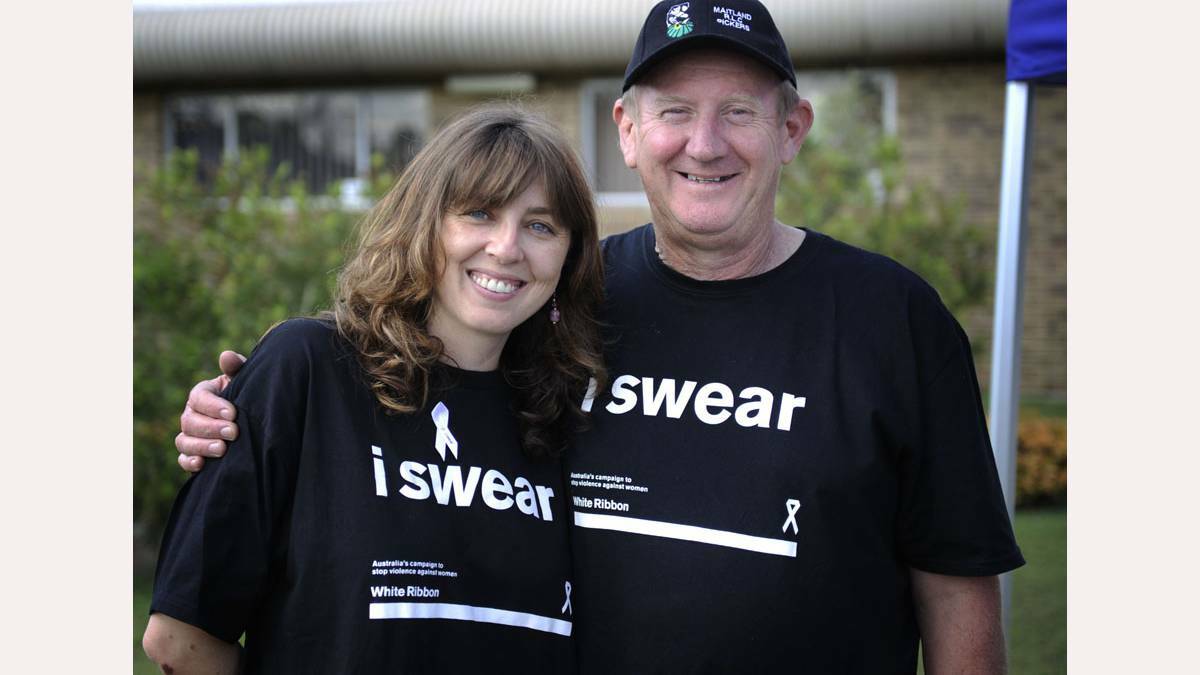 Nicole Cooney from Maitland Community Centre and White Ribbon Day ambassador Merv Fullford. Picture: Maitland Mercury.