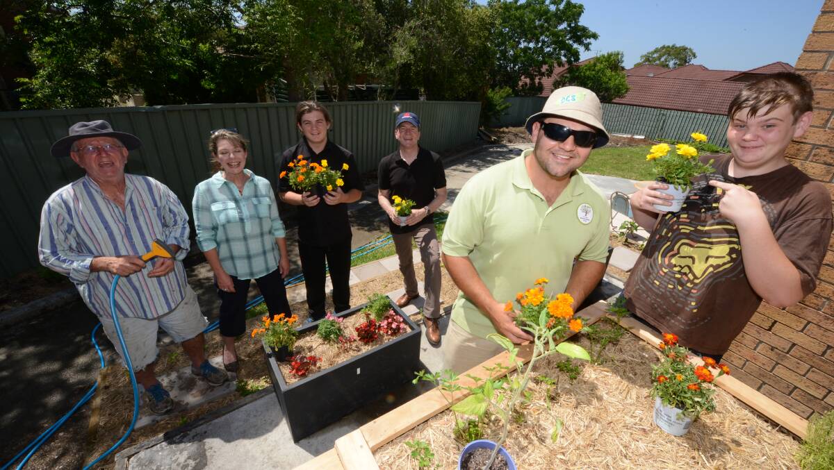 Learning about Community Greening: Clem Collier, with project co-ordinator Michaela Nagel, Jorden Darragh executive director of Botanical Gardens and Centennial Parklans Kim Ellis, Aboriginal education officer with Community Greening Brenden Moore, and Jai Keevers.