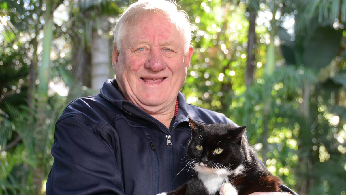 Graham Gibson OAM with his cat, 19-year-old Bonnie.