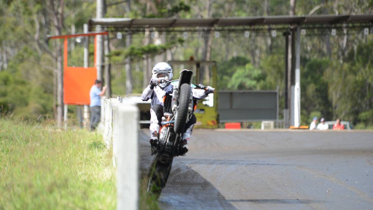 Troy Bayliss at practice on the Old Bar Roadside circuit on Friday.