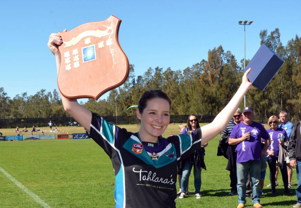 Winners are grinners: Taree City captain Brooke Murray with the Group Three league tag premiership shield at the side's 10-4 win over Wauchope in the grand final.