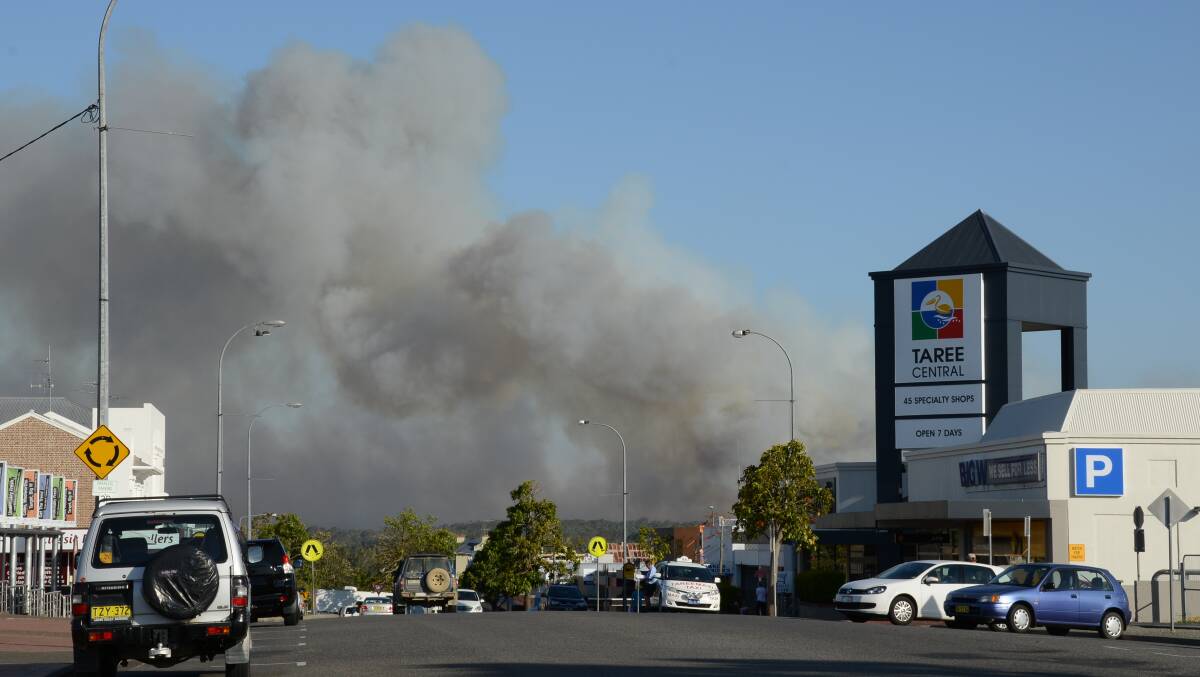 September 26, 2013 and a fire south of Taree blocks Old Bar Road and jumps the highway.