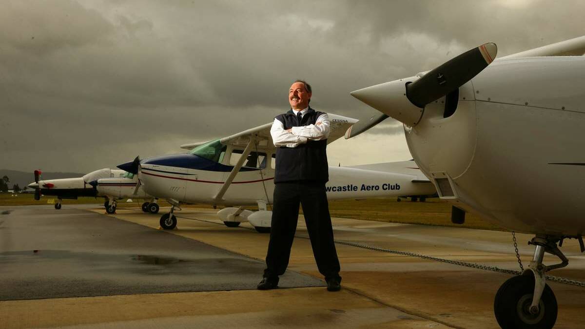 WINNERS: Royal Newcastle Aero Club at Rutherford and its chief instructor, Phil Unicomb, have picked up  national aviation awards.   Picture: Peter Stoop

