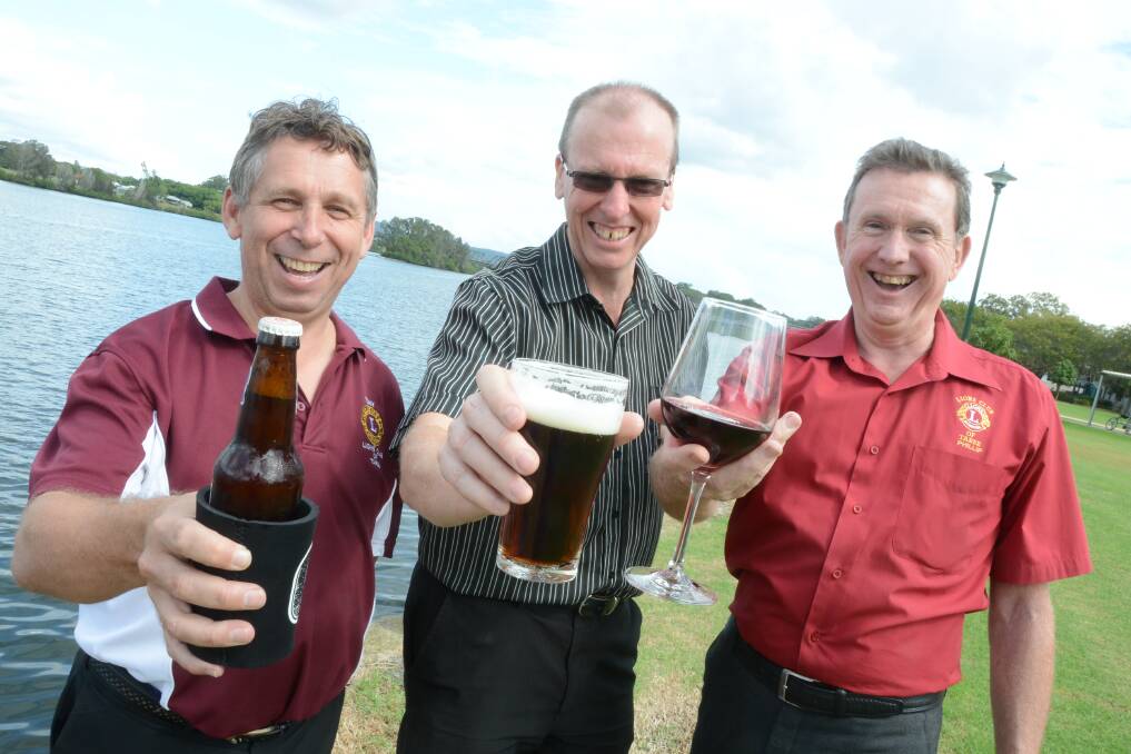 Taree Lions Club member Tony Cowan, TasteFest on the Manning chairman John Lenton and festival co-ordinator Phillip Grissold of Taree Lions Club cheers on the banks of the Manning River, the site for new food festival 'TasteFest on the Manning'. 