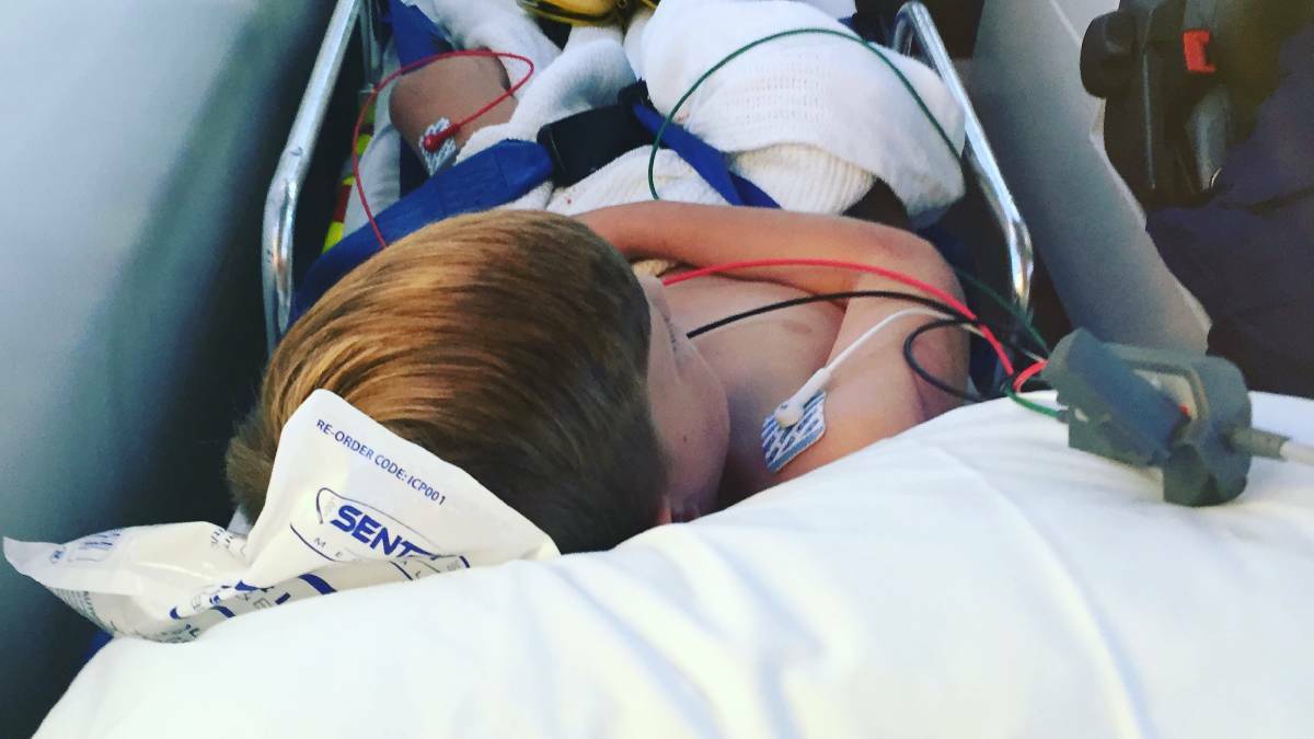 Fletcher, 8, was taken to Port Macquarie Hospital following being hit by a car. 