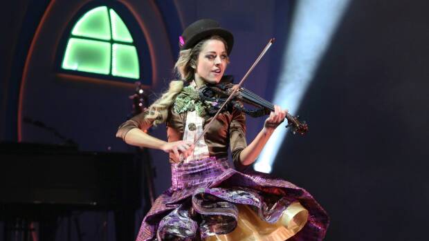Lindsey Stirling performing in Atlanta as part of her Warmer in Winter tour. Photo: Katie Darby / AP

