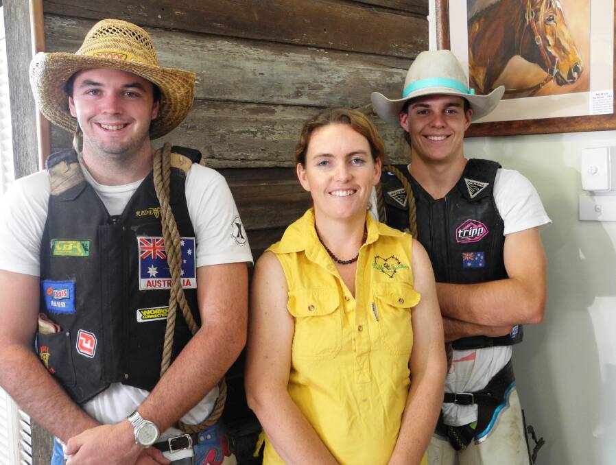 Ben Gallagher(L) and Braedyn Cameron with Candice Wilkinson at Double C Saddlery.