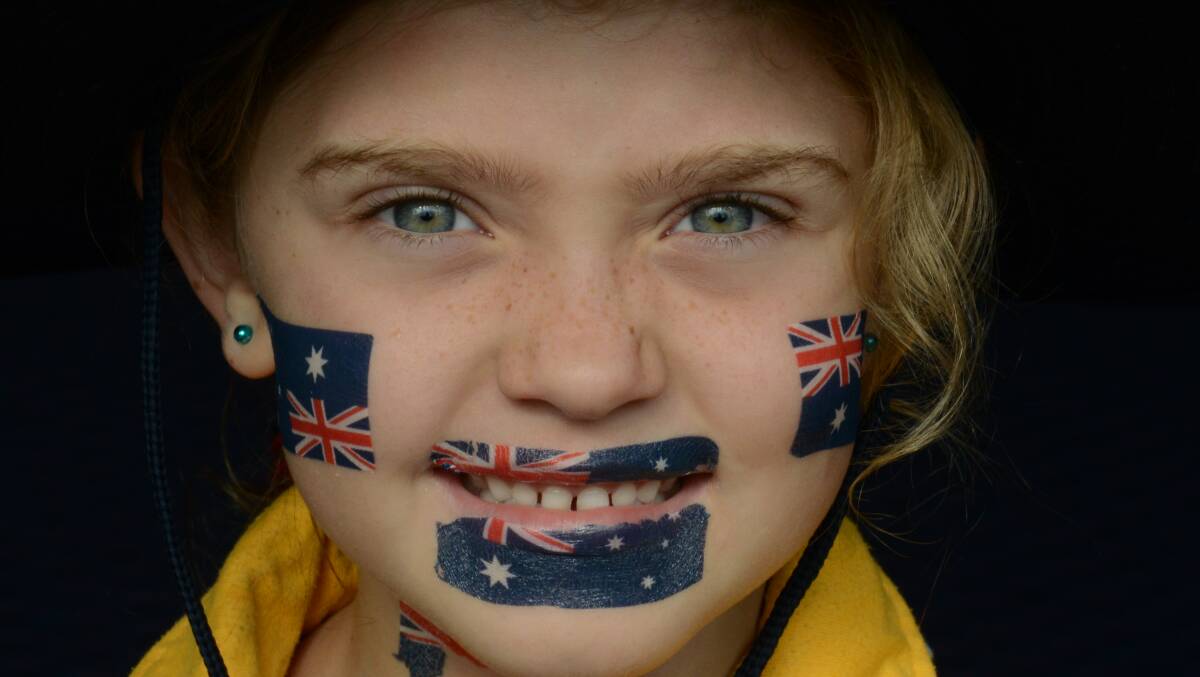 Chloe Magnussen shows off some new tattoos at Greater Taree's Australia Day ceremony.