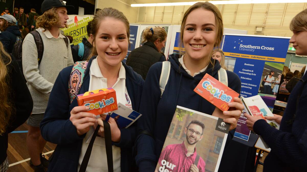 Wingham High School students Stacie Fahey and Caitlyn Cameron were happy with their handouts.

