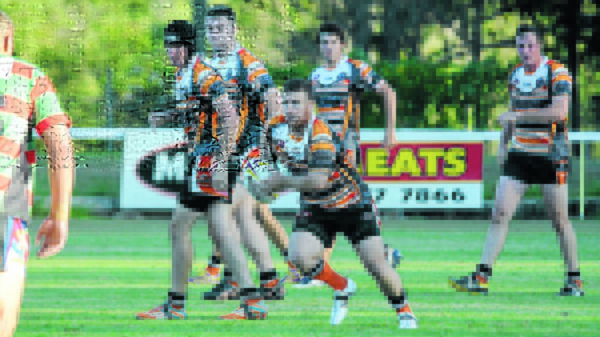 Adam Kerr makes a dash during the trial game against Hawks Nest-Tea Gardens earlier this month at Wingham.