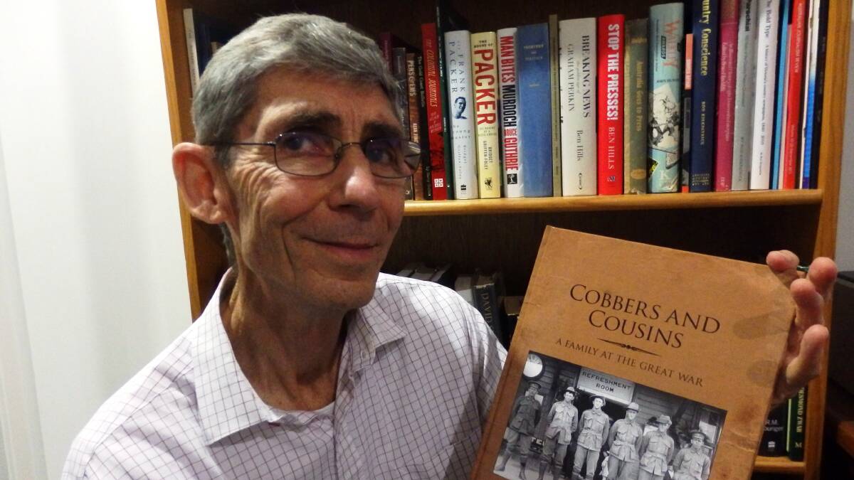 Rod Kirkpatrick with his book ‘Cobbers and Cousins’ commemorates the war efforts of the Laurie family, many of whom hailed from Gloucester. 
