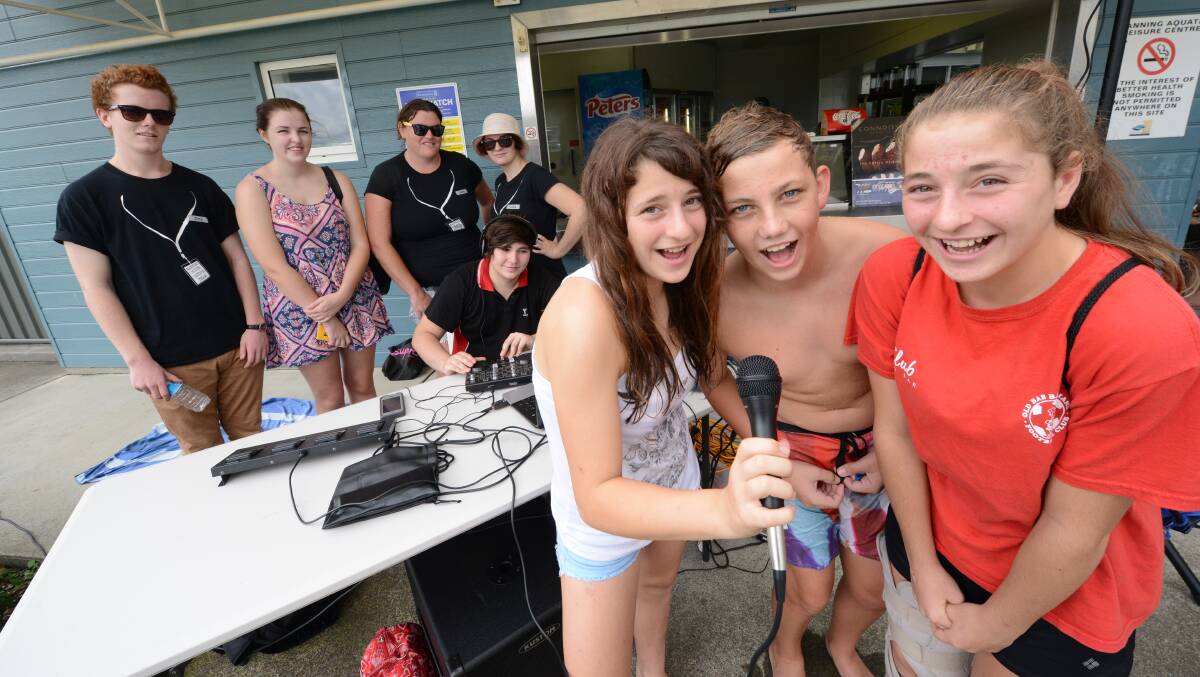Jessica Croker, Sam Hillyard and Sam Croker get loud at the YMCA Manning Aquatic Leisure Centre Youth Week Open Day. Listening in the background is Otto Fallson-Ree, Kaitlin Brown, Jane Lynch, Tasha-Joy Burton and Nick Croker.