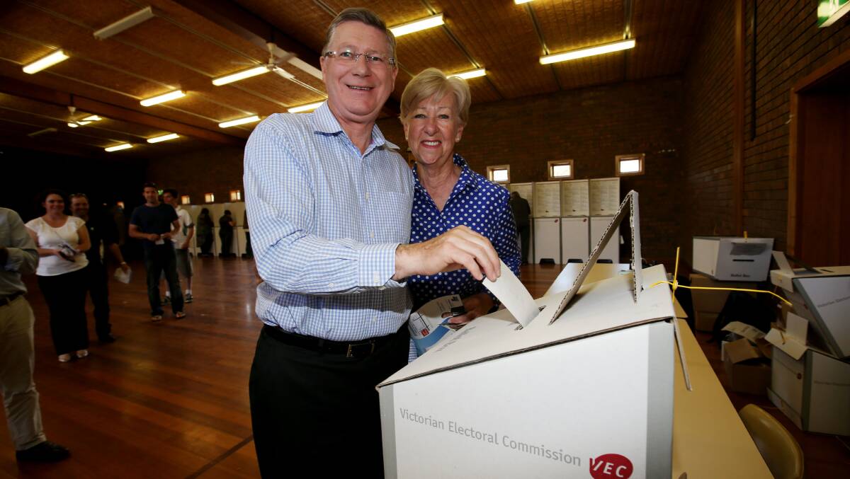 Premier Denis Napthine and his wife Peggy voting at the polling booth at Port Fairy's St Patrick's Primary School. Picture:LEANNE PICKETT