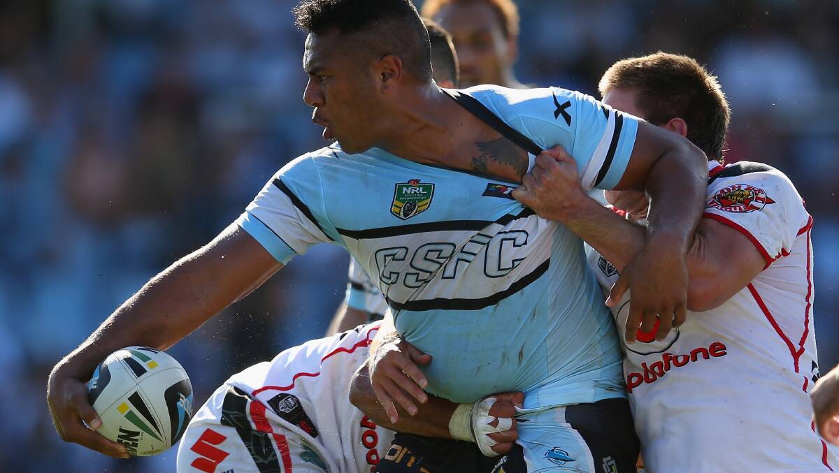 Siosaia Vave of the Sharks looks to pass. The Sharks trounced the Warriors 37-6 to record their first win for the season. Picture: Getty Images