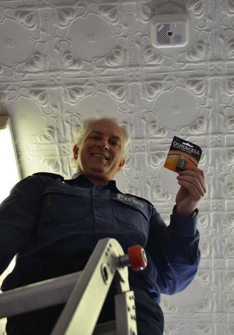 Glen Innes Fire Station commander Matt Goldman and his colleagues are happy to assist seniors to replace their smoke alarm batteries. Picture: Glen Innes Examiner