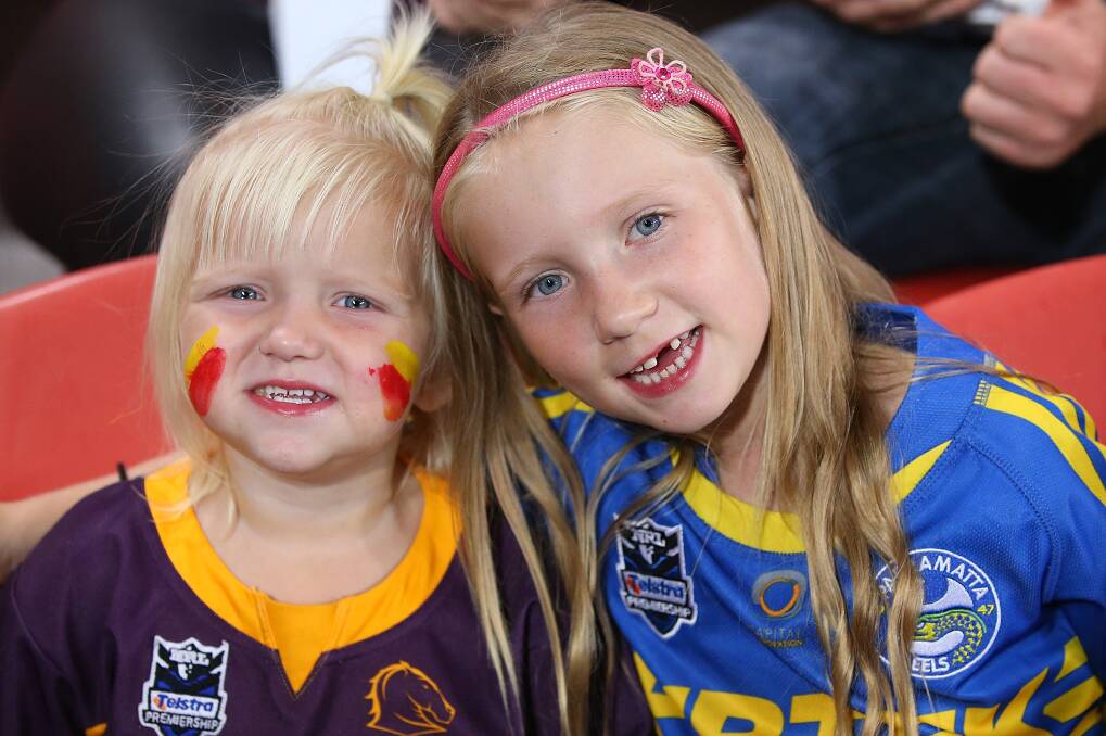 Broncos and Eels fans show their colours at Suncorp Stadium. The Eels defeated the Broncos 25-18 on Brisbane turf in Round Five of the NRL. Picture: Getty Images
