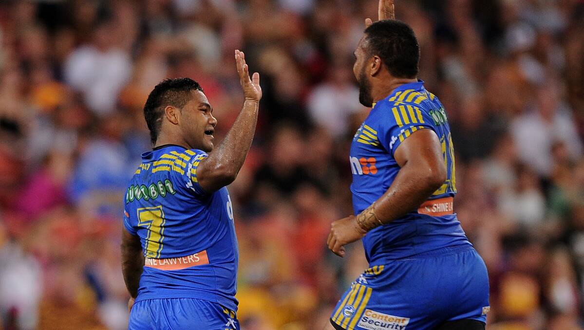 Chris Sandow of the Eels celebrates after kicking a field goal. The Eels defeated the Broncos 25-18 on Brisbane turf in Round Five of the NRL. Picture: Getty Images