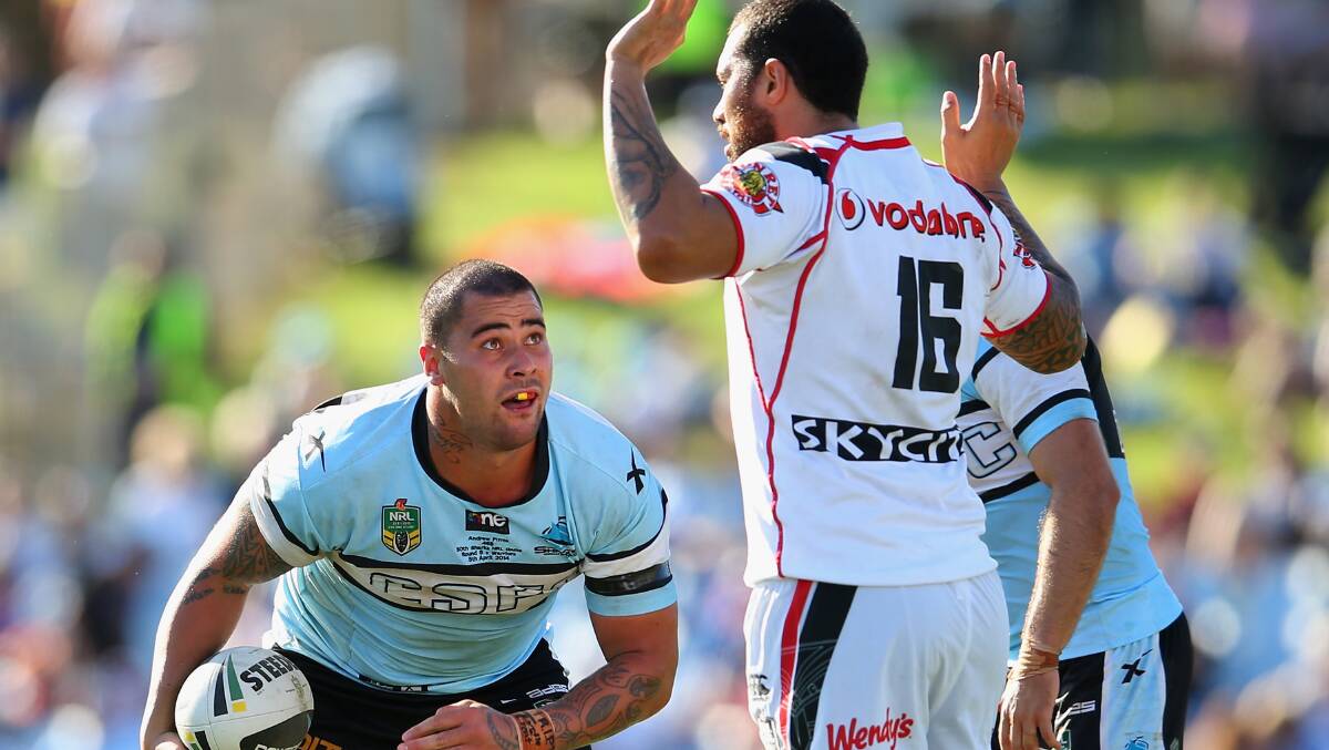 Andrew Fifita of the Sharks looks up at Feleti Mateo of the Warriors . The Sharks trounced the Warriors 37-6 to record their first win for the season. Picture: Getty Images