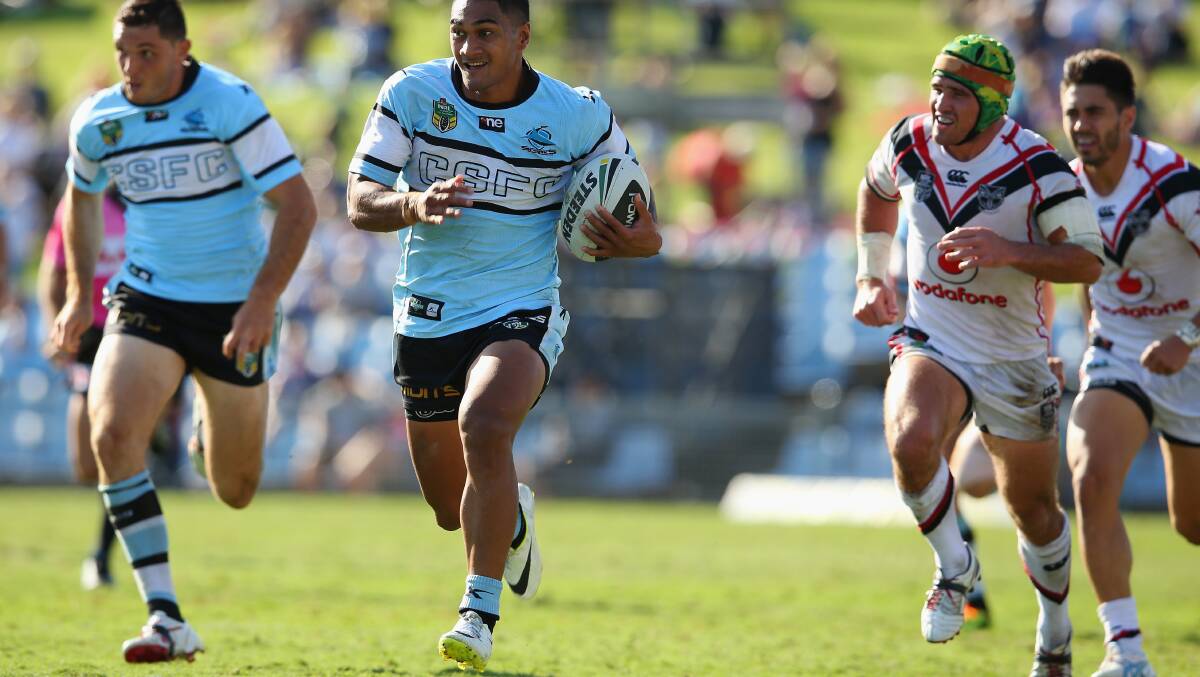Ricky Leutele of the Sharks makes a break. The Sharks trounced the Warriors 37-6 to record their first win for the season. Picture: Getty Images