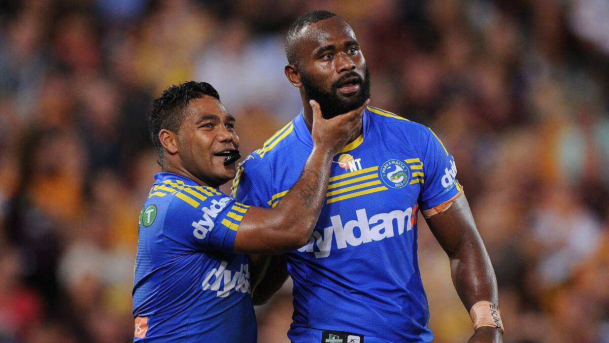 Chris Sandow of the Eels congratulates Semi Radradra after scoring a try. The Eels defeated the Broncos 25-18 on Brisbane turf in Round Five of the NRL. Picture: Getty Images