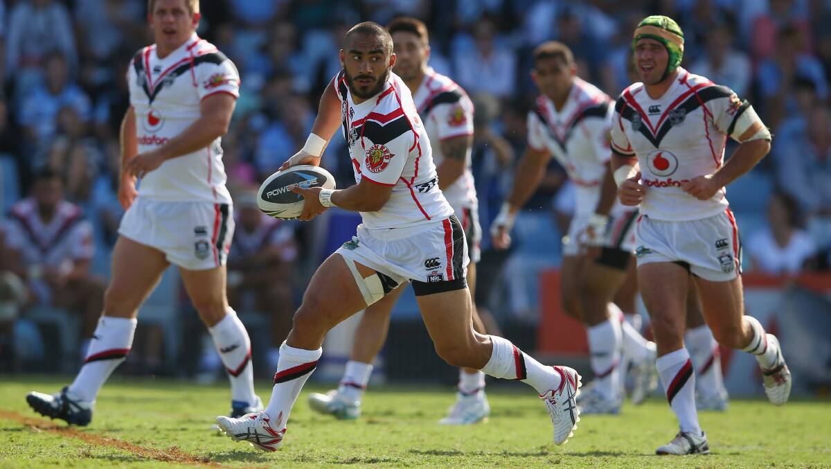 Thomas Leuluai of the Warriors looks to pass. The Sharks trounced the Warriors 37-6 to record their first win for the season. Picture: Getty Images