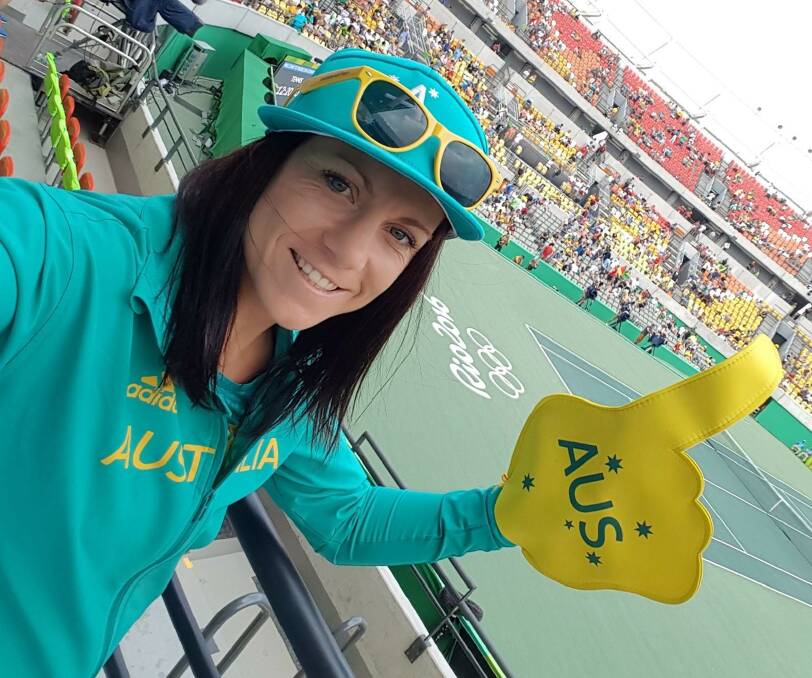 WHAT AN EXPERIENCE: Shelley Watts supporting her Australian team mates in Rio. Her boxing campaign ended in a controversial split decision, not in Shelley's favour.