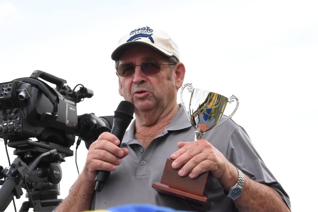 Big win: Port Macquarie trainer Neil Godbolt with the Hannam Vale Cup. He has three-year- Harnova  in the Hydra Hose Class 3 Handicap on Christmas Eve. Photo: Scott Calvin. 