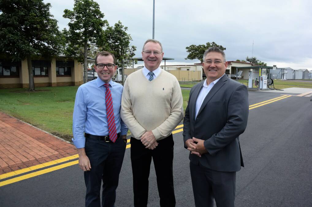 Bringing the people: NSW tourism and major events minister Adam Marshall, member for Myall Lakes Stephen Bromhead and MidCoast Council's Paul De Szell expect a boost in tourism following upgrades to Taree Airport.