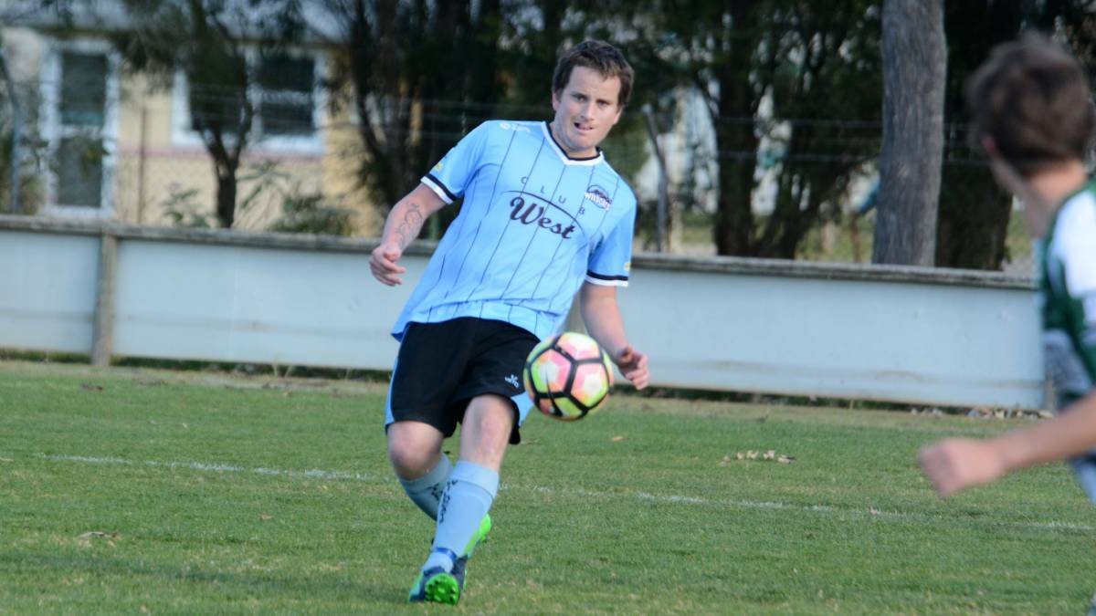 Taree's Tom Griffen goes on the attack during a match with Kempsey Saints last season. A promotion/relegation system will be introduced to the Premier League in 2019.